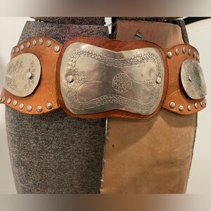 Coachella worthy One of a kind hand made leather belt with stamped silver.